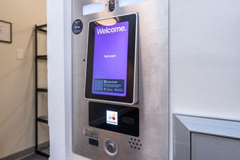 a close up of a refrigerator door with a welcome screen on it at Union 346, Somerville, MA 02143